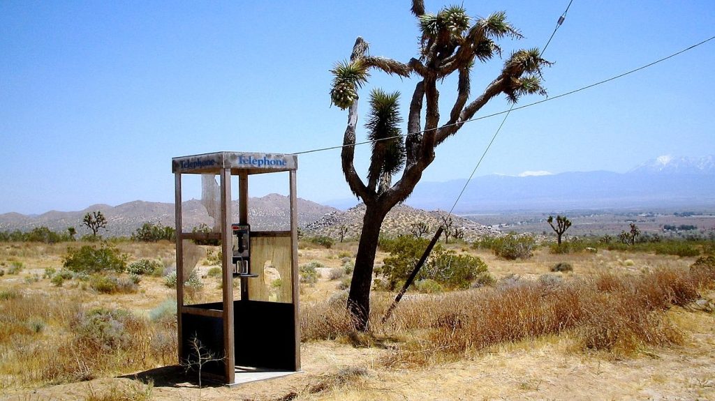 Photo of the Mojave phone booth, courtesy https://commons.wikimedia.org/wiki/File:Mojave_Phone_Booth.jpg